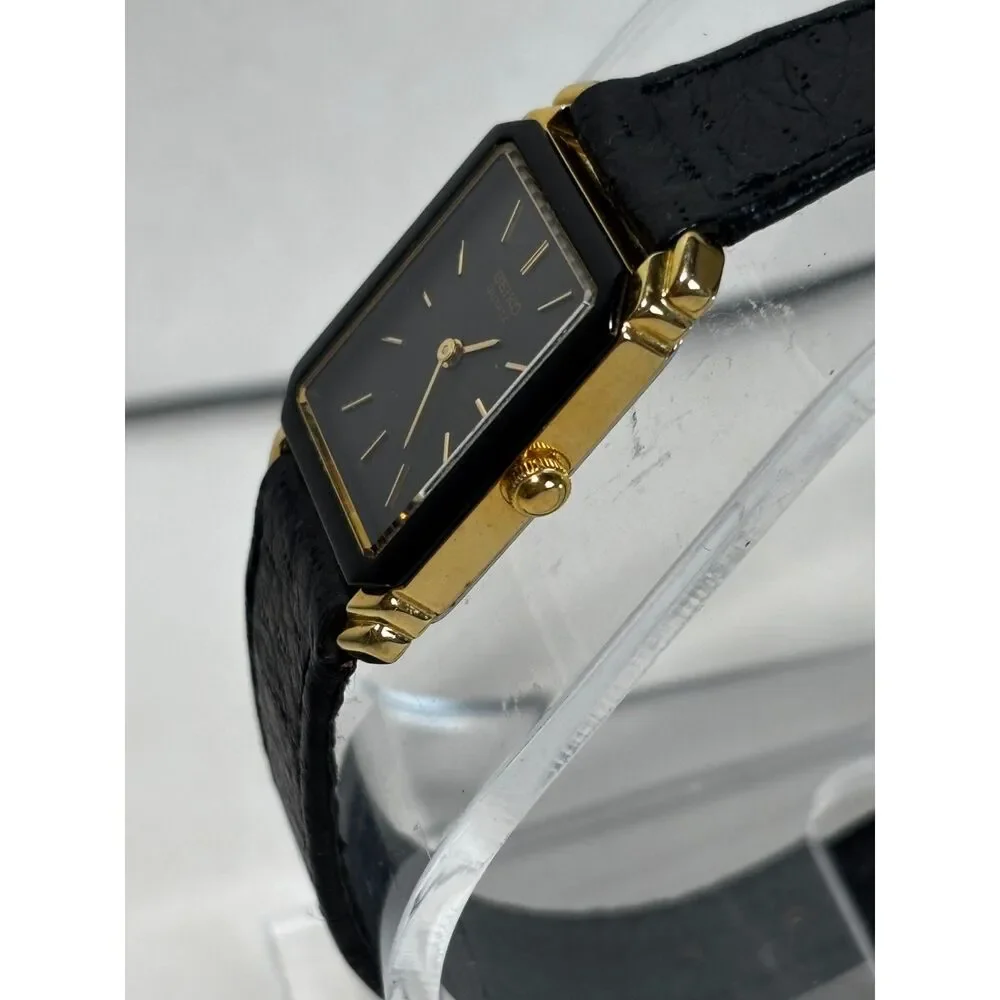 Vintage Seiko 2P20-5000 gold tone women's watch with black leather, working